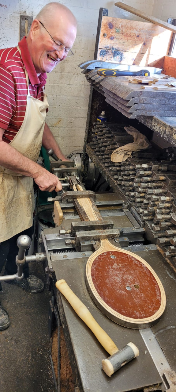Tim Dowe working at the glue bench